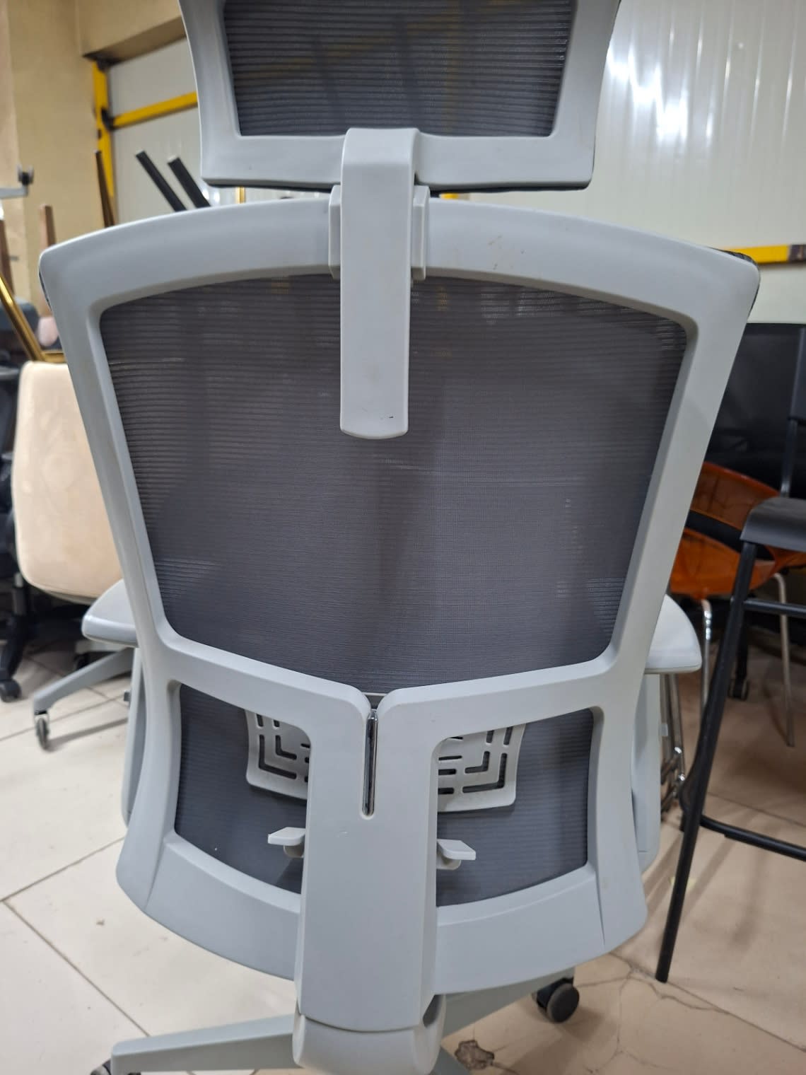 grey ergonomic office desk chair on wheels 3