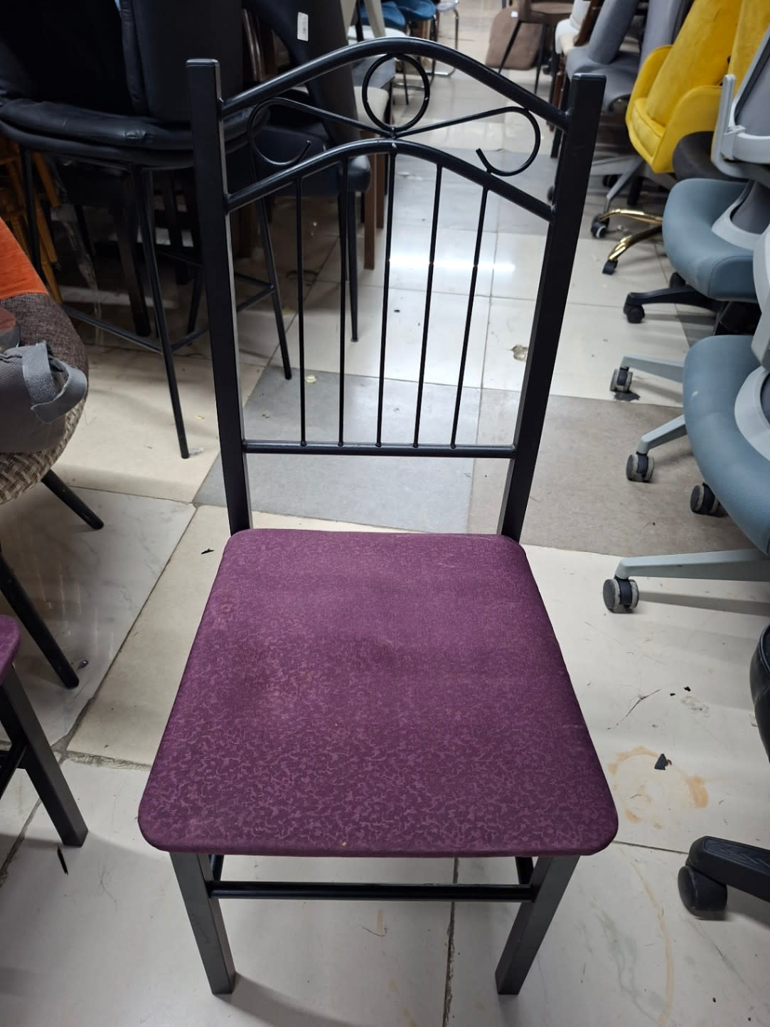 metal dining chair with an upholstered seat