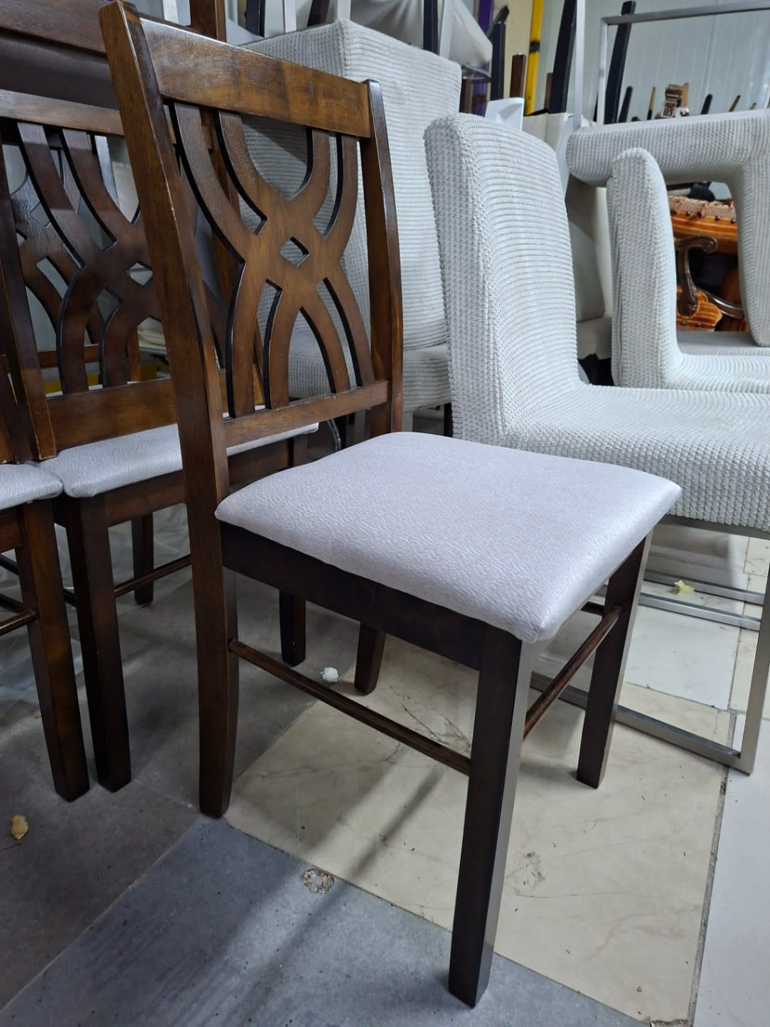Additional angle of new wood dining chair dark brown frame upholstered seat at Bufaisal Shop C Ajman