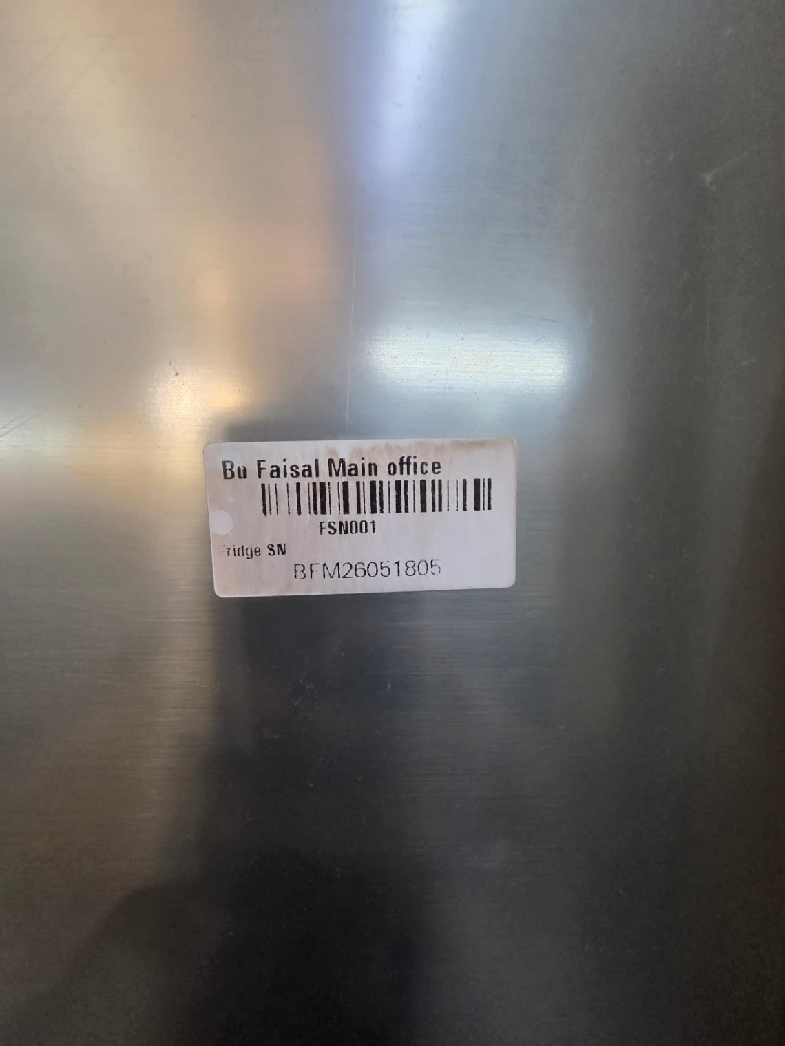 Bufaisal barcode label BFM26051805 for used Samsung top-mount refrigerator at Shop D Ajman