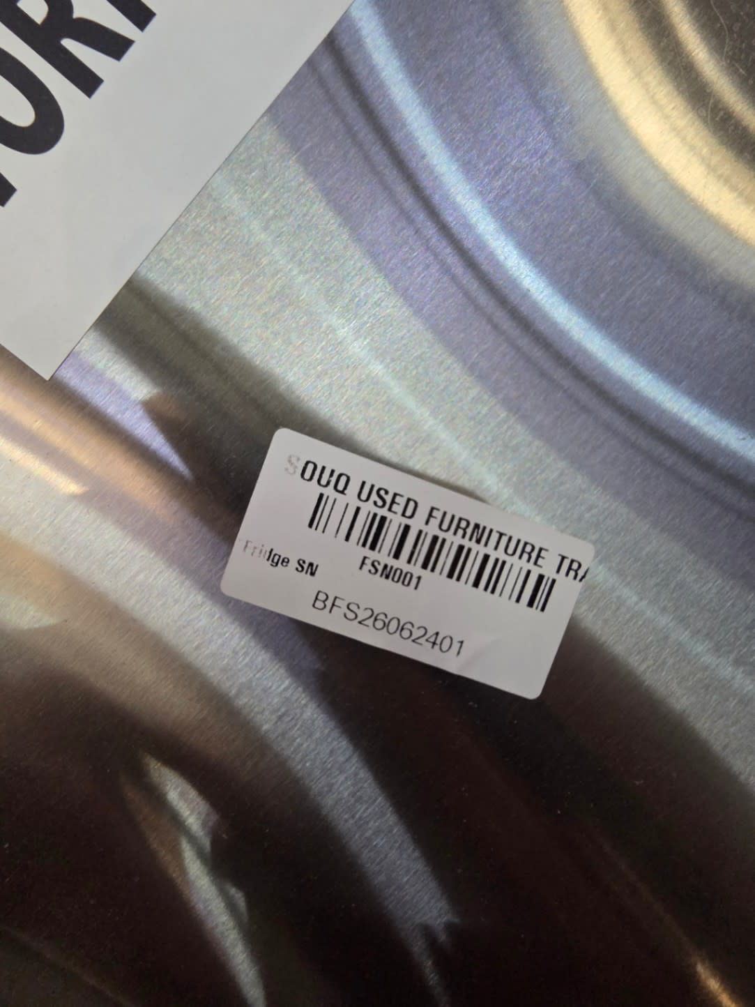 Bufaisal barcode label BFS26062401 for used LG side-by-side refrigerator at Shop D Ajman