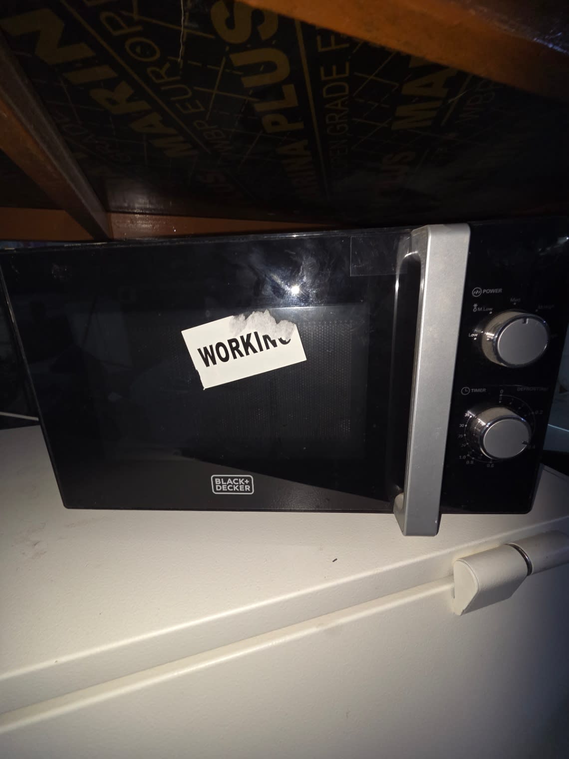Bufaisal item reference for used BLACK+DECKER solo microwave oven, item ID 7c958dab