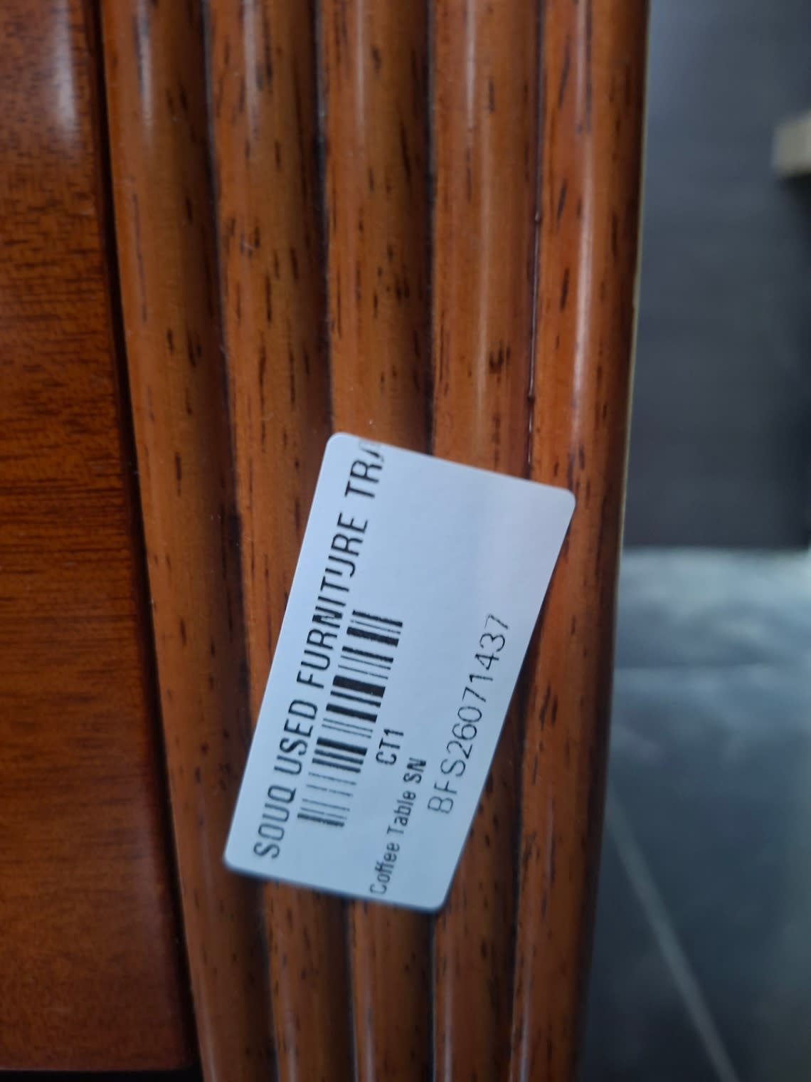 Bufaisal barcode label BFS26071437 for used square coffee table at Shop C Ajman