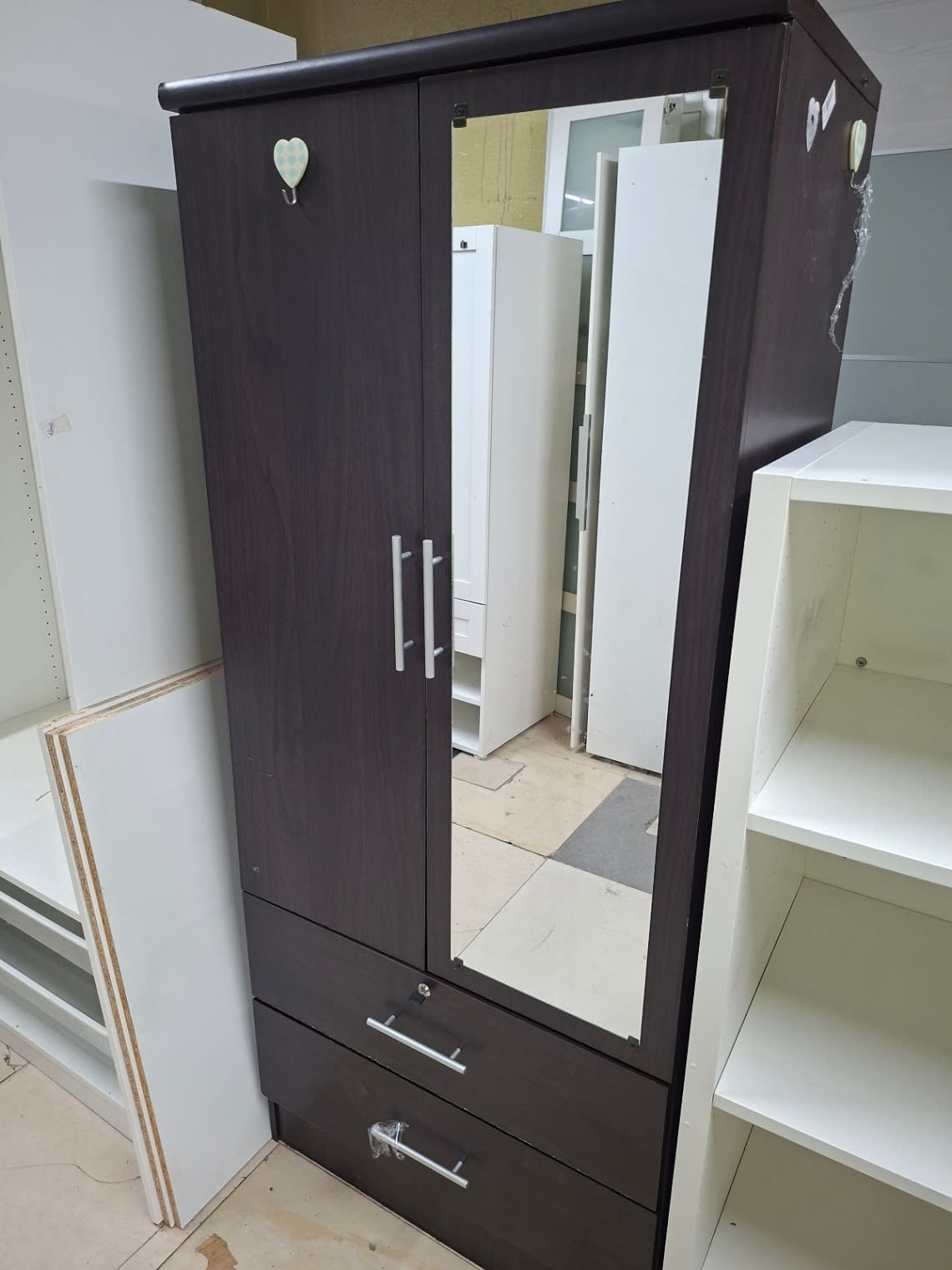 Angle view of used 2-door wardrobe with mirror and drawers at Bufaisal Shop C Ajman