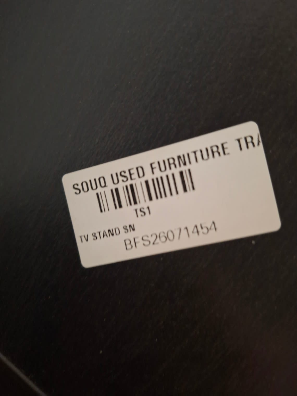 Bufaisal barcode label BFS26071454 for used black TV stand