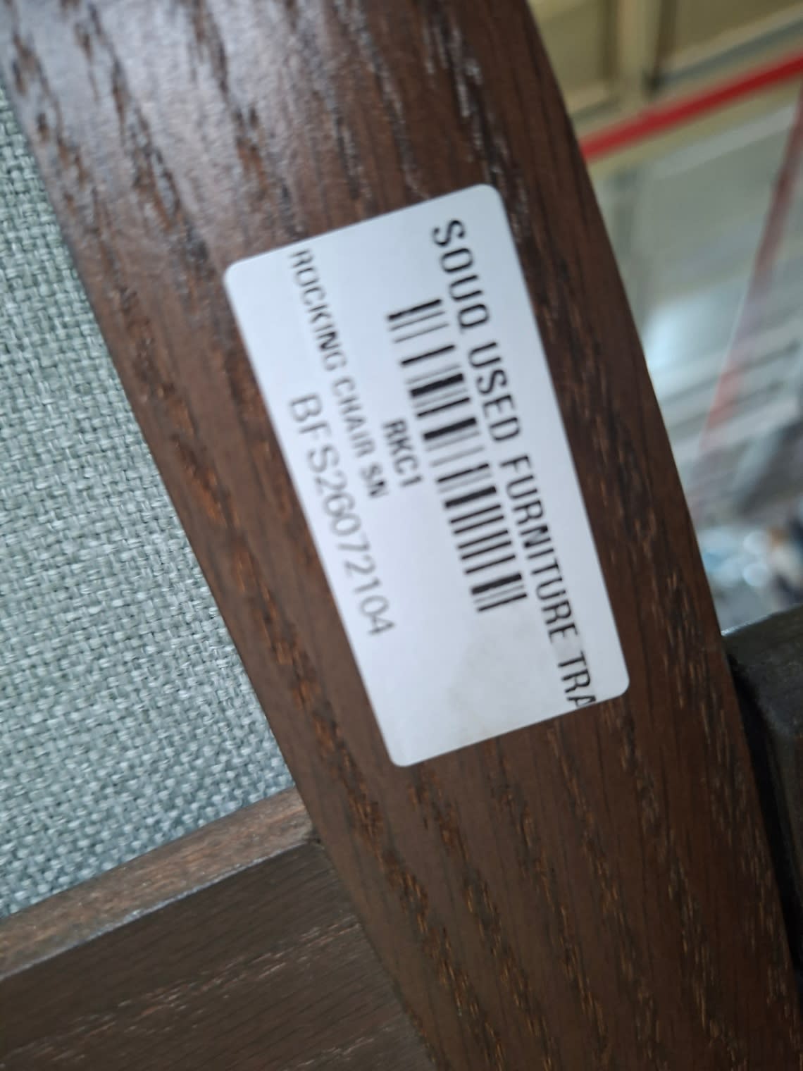 Bufaisal barcode label BFS26072104 for used rocking accent chair at Shop C Ajman