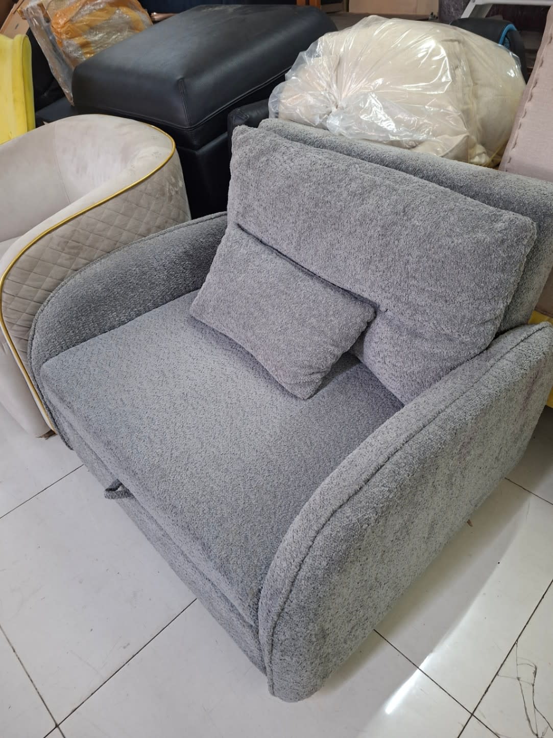 Bufaisal barcode label for used grey boucle single sofa bed — label unreadable
