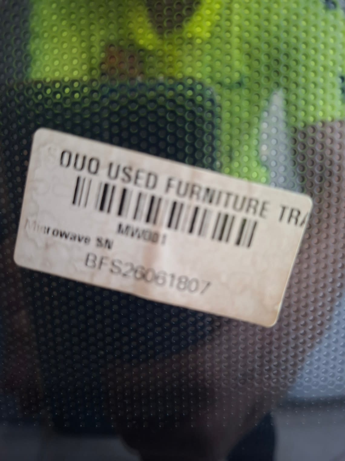 Bufaisal barcode label BFS26061807 for used Black+Decker microwave oven