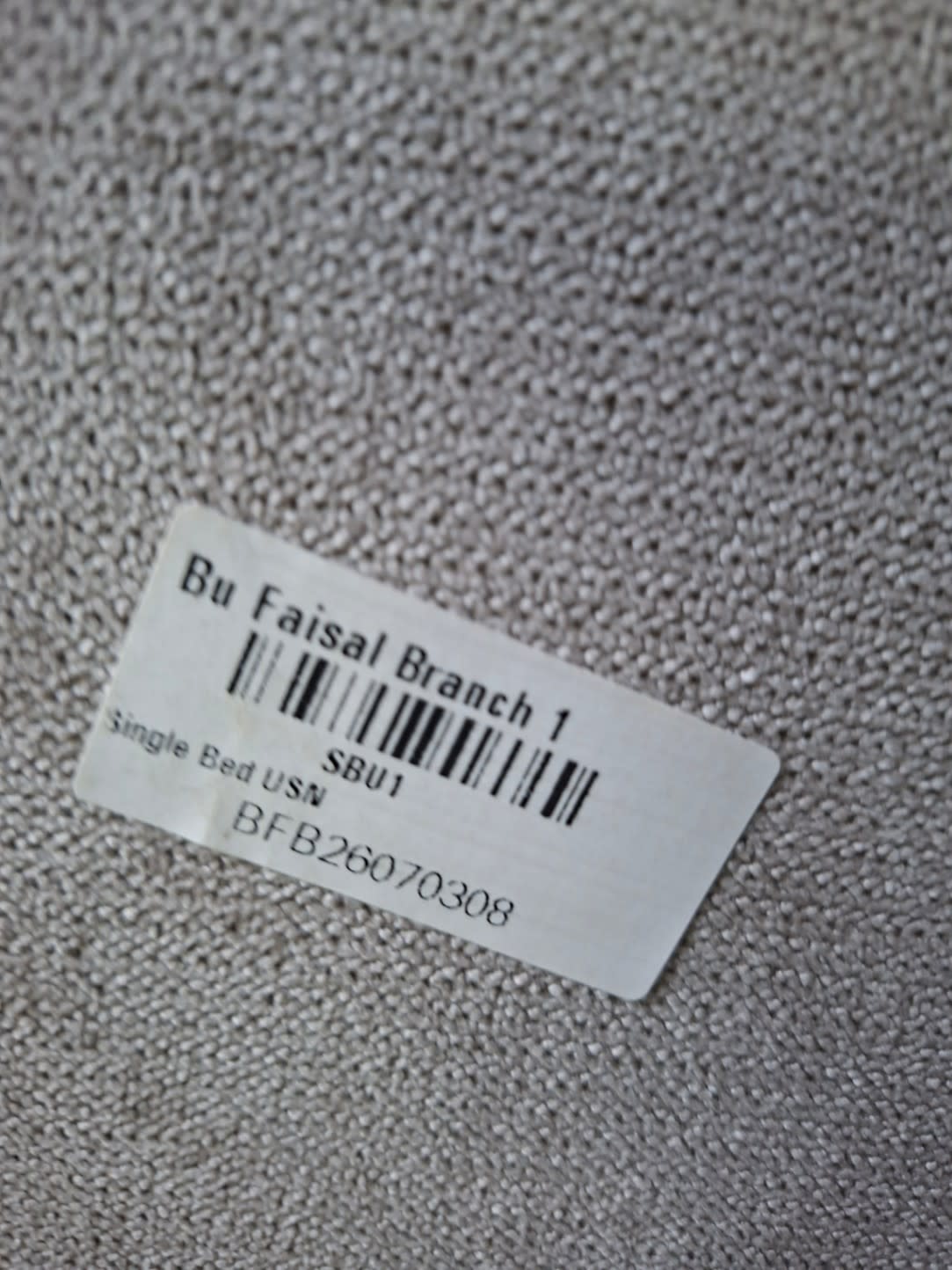 Bufaisal barcode label BFB26070308 for used kids single bed frame at Branch 1 Ajman