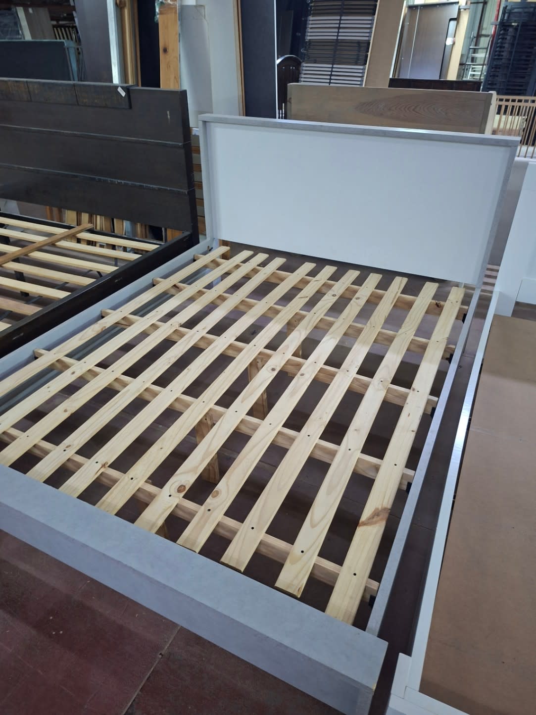 Bufaisal barcode label for used queen bed frame at Shop D Ajman
