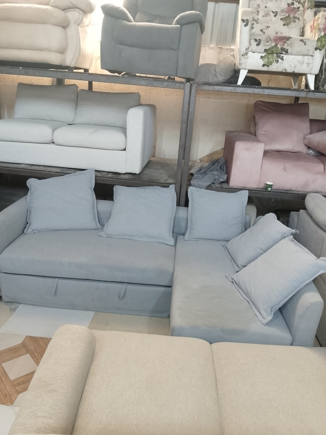 Bufaisal item label for used L-shape sectional sofa at Shop D Ajman
