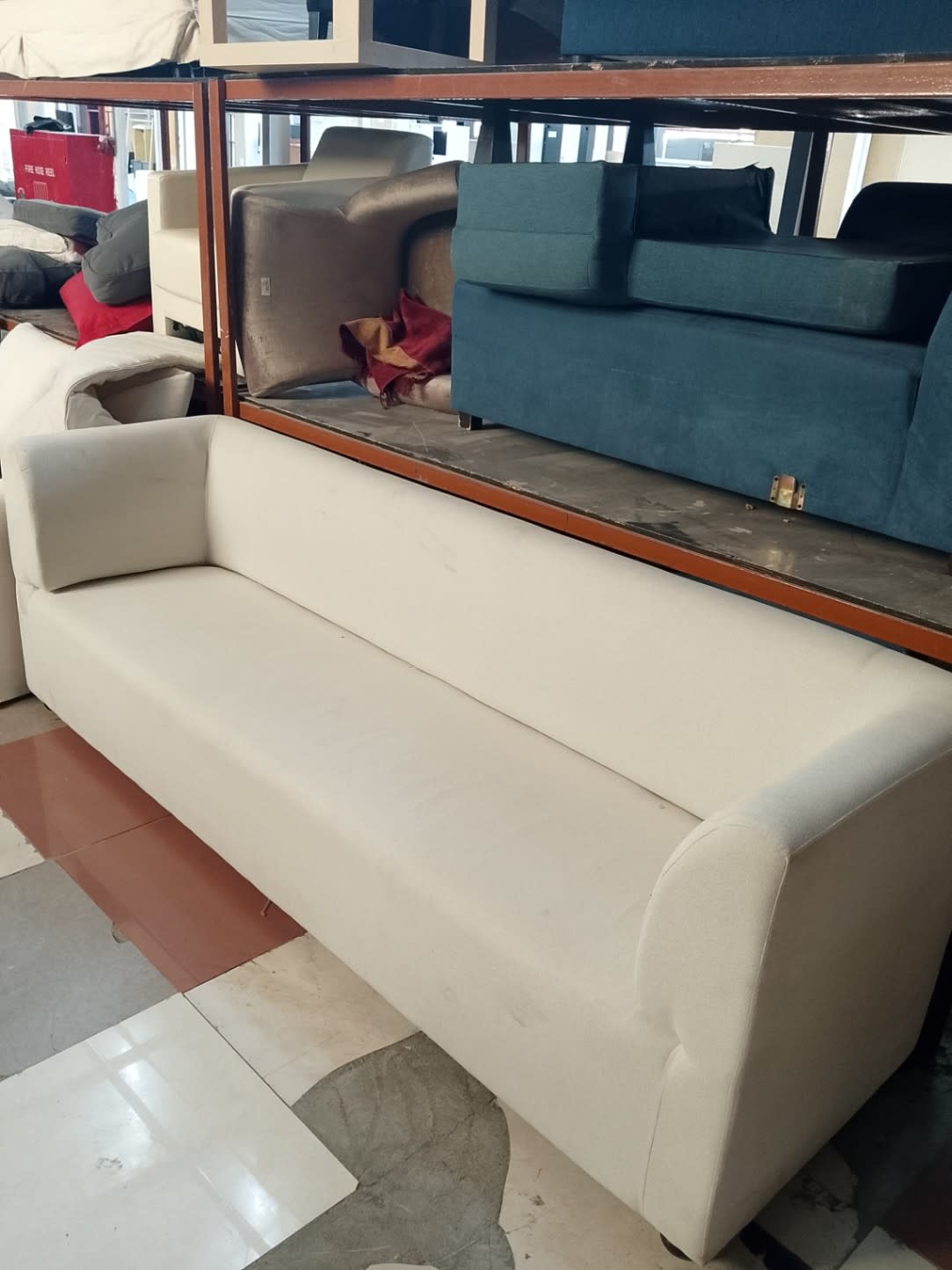 Second front angle of used cream 3-seater sofa showing overall condition at Bufaisal Ajman