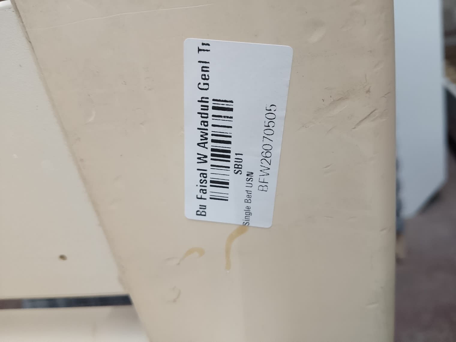 Bufaisal barcode label BFW26070505 for used single bed frame at Shop D Ajman