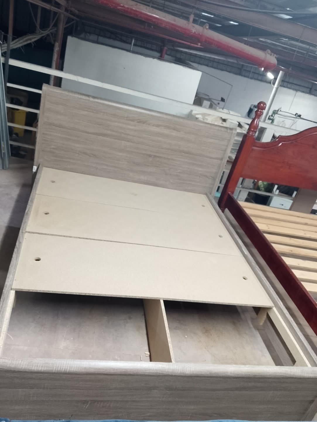 Bufaisal barcode label for used storage bed frame with under-bed drawers at Shop D Ajman