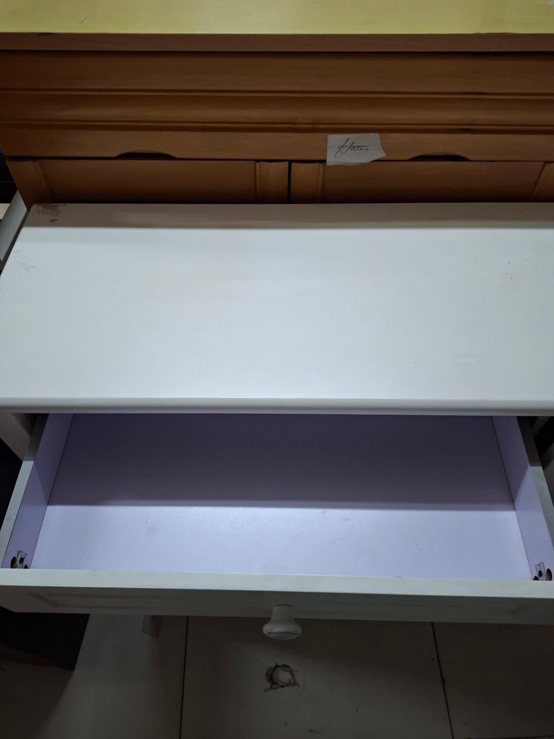 Top drawer open on used white shoe cabinet showing clean interior at Bufaisal Ajman
