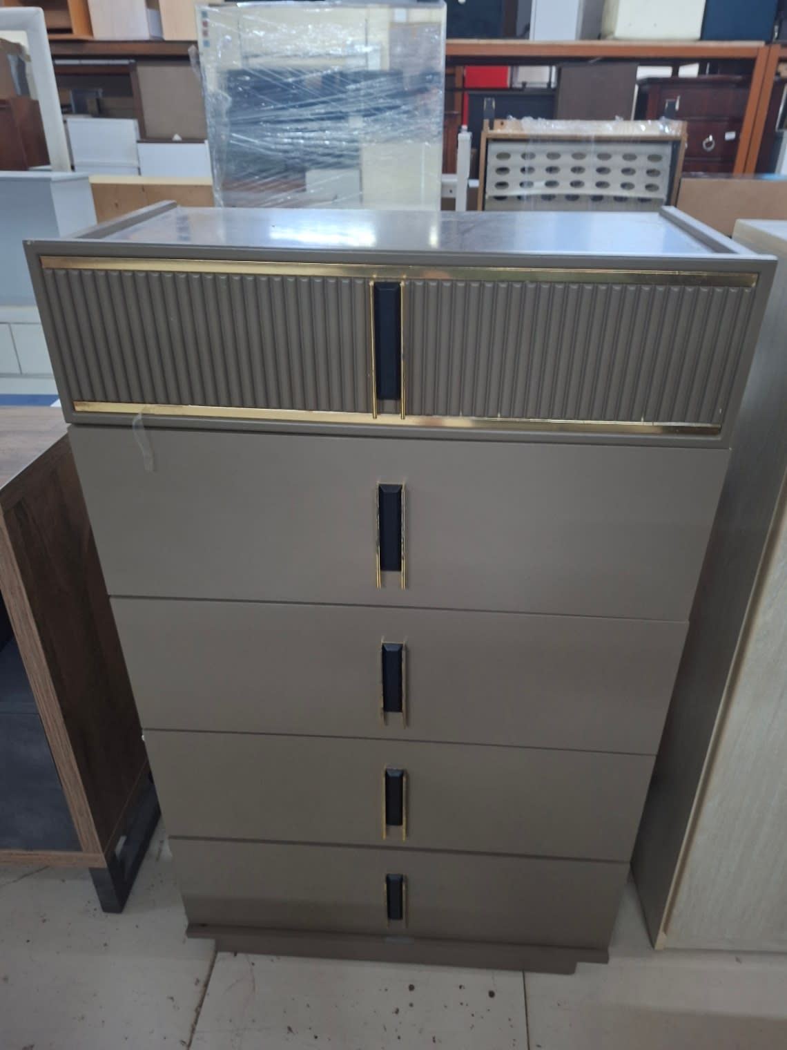 Bufaisal barcode label for used tall chest of drawers at Shop C Ajman