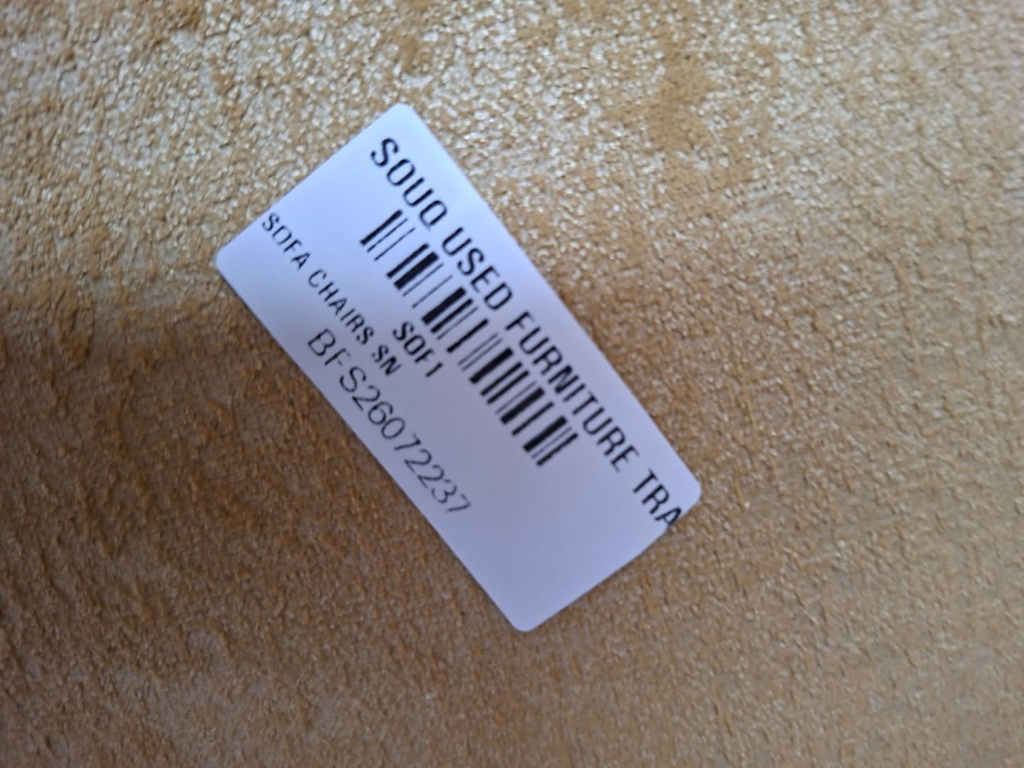 Bufaisal barcode label BFS26072237 for used tub accent chair at Shop C Ajman