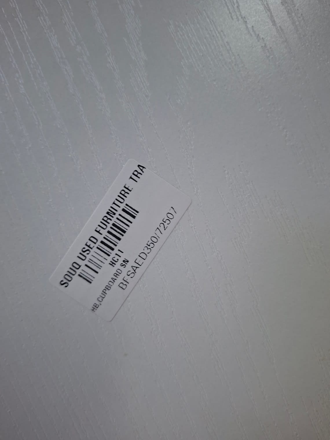 Bufaisal barcode label BFSAED35072507 for new 3-door white wardrobe