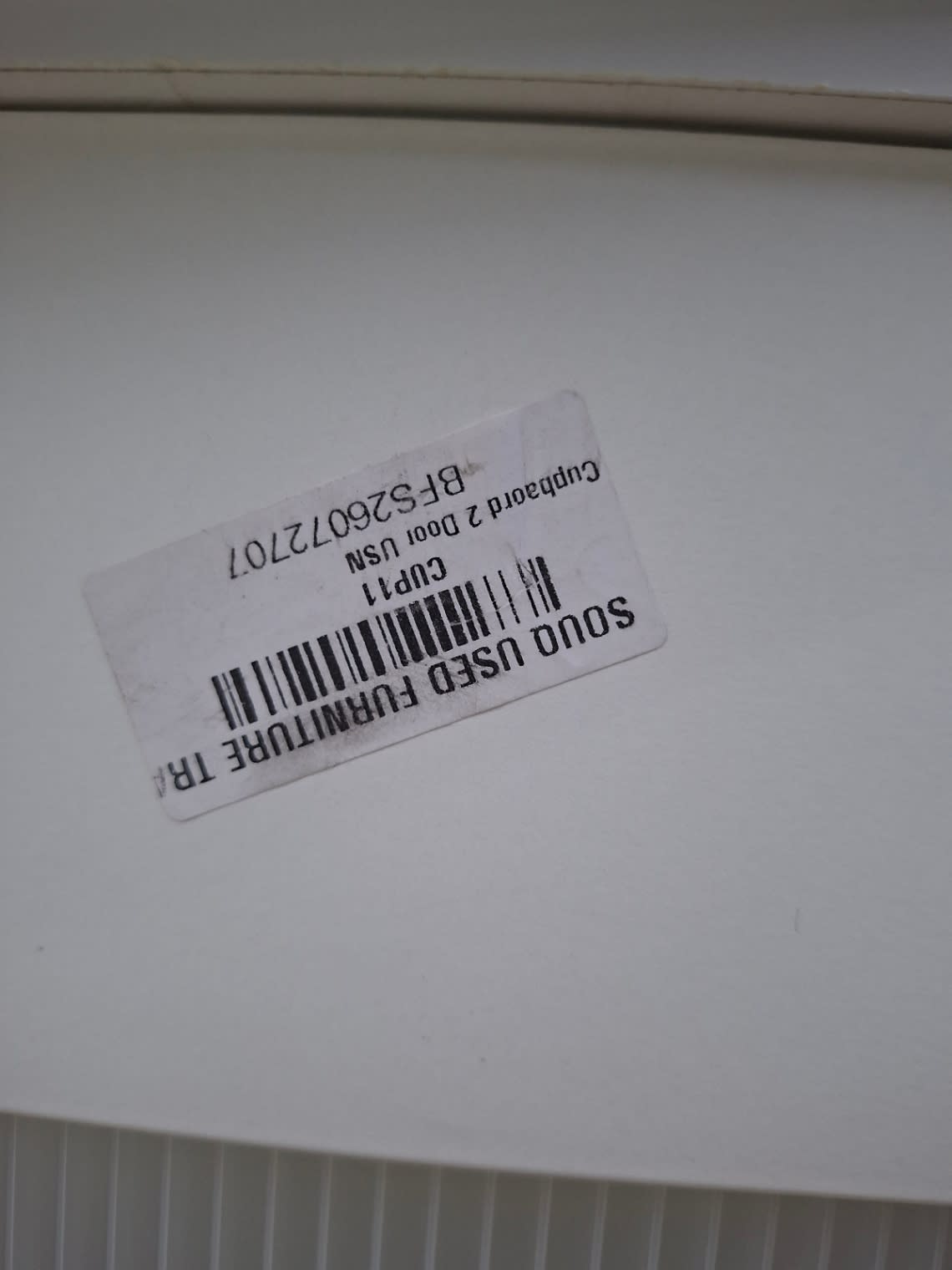 Bufaisal barcode label BFS26072707 for used 2-door white wardrobe