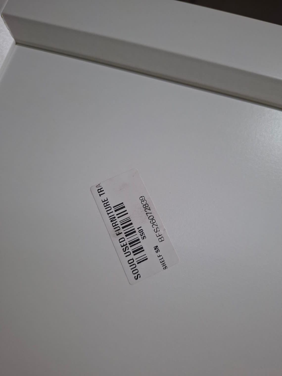 Bufaisal barcode label BFS26072839 for used white storage cabinet at Shop C Ajman