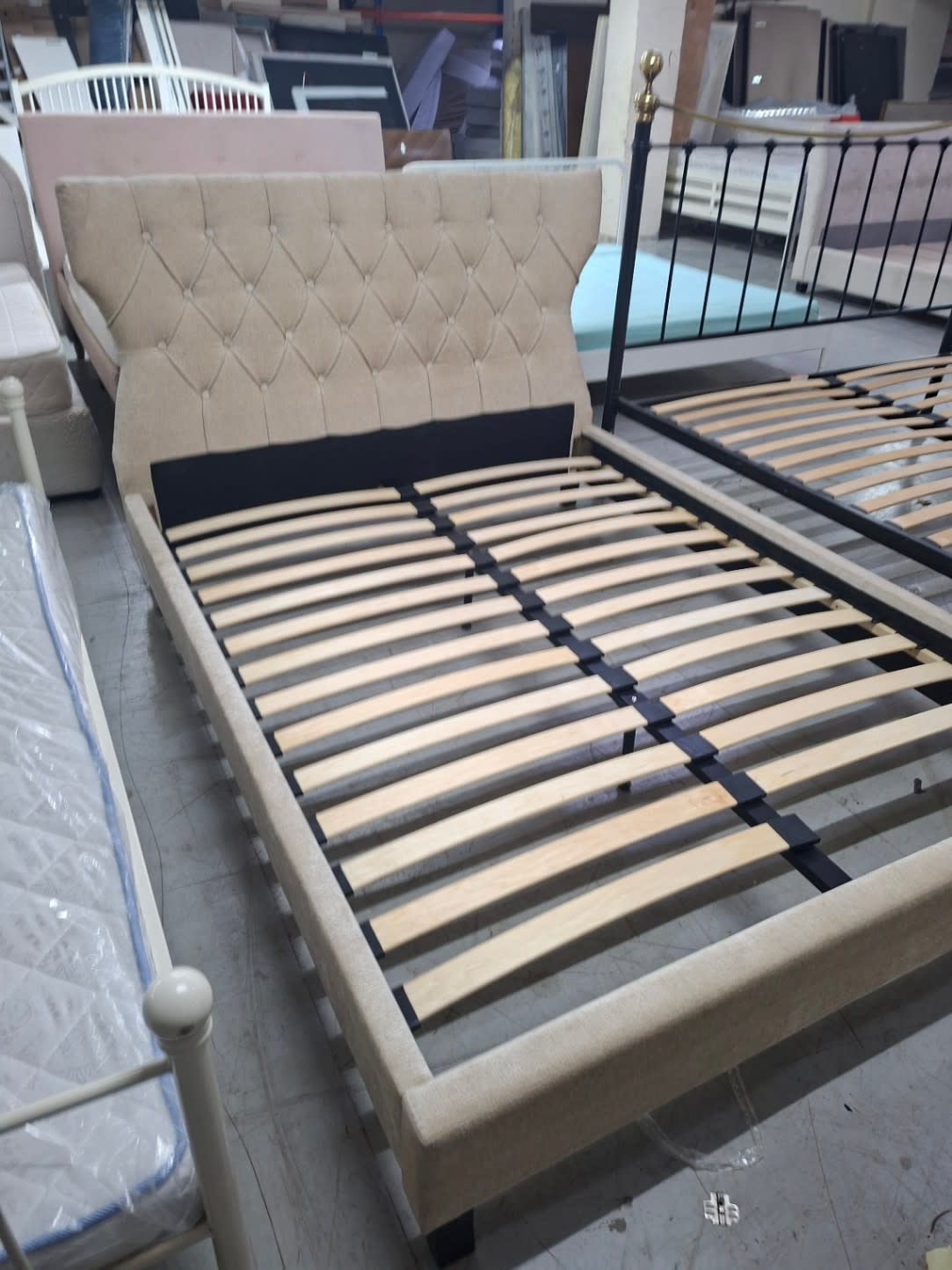 Bufaisal barcode label for used beige upholstered sleigh bed frame — barcode unreadable