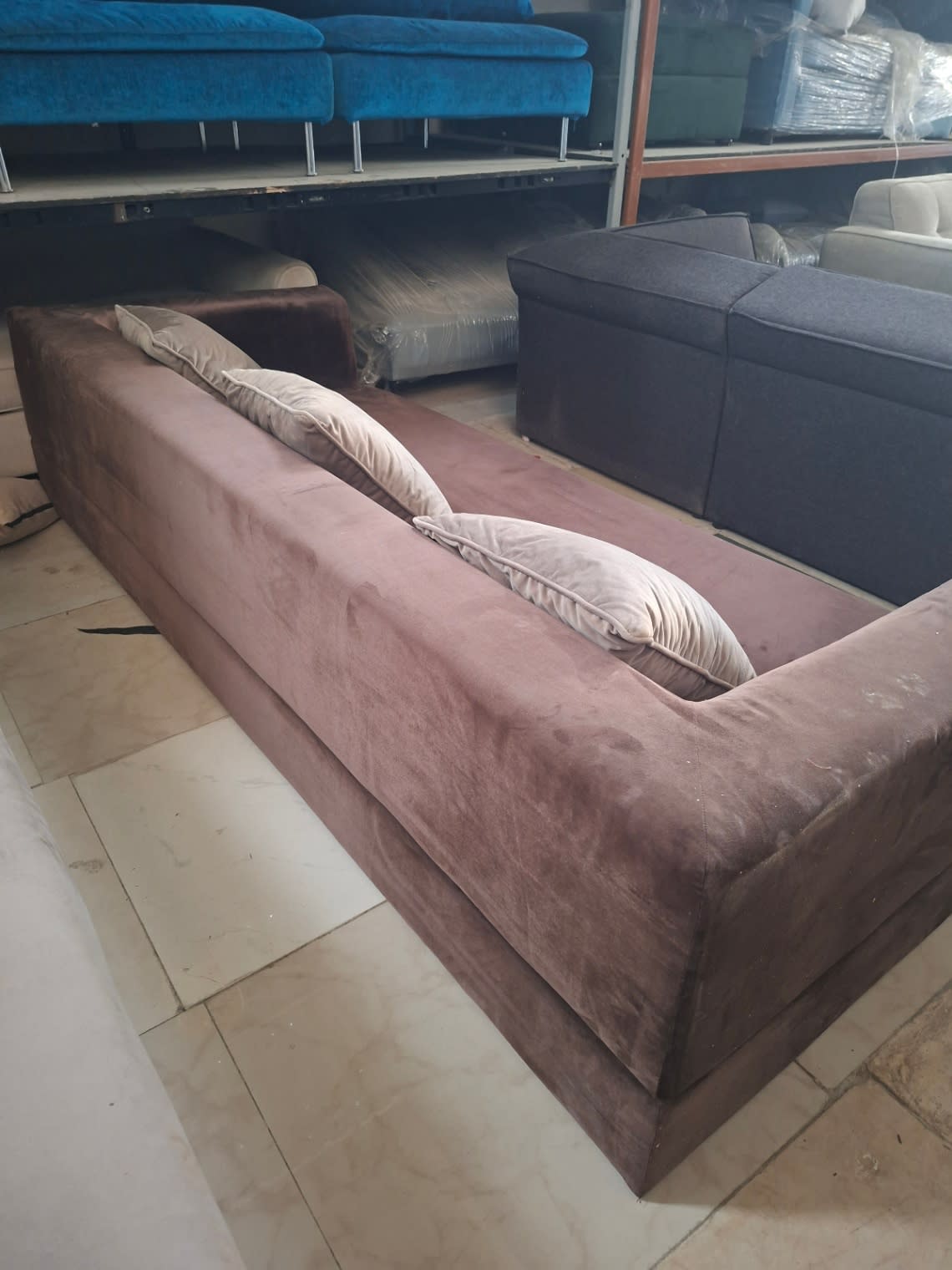Rear angle of used mauve velvet 3-seater sofa showing back panel condition at Bufaisal Shop D Ajman