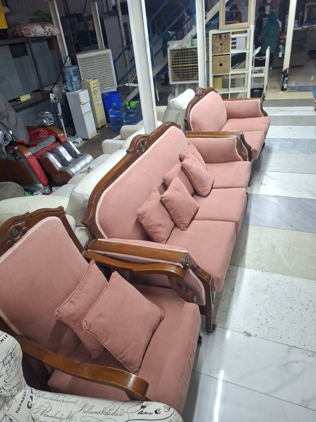 Full view of used classic carved wood sofa set blush pink, 3-seater, 2-seater and armchair at Bufaisal Ajman
