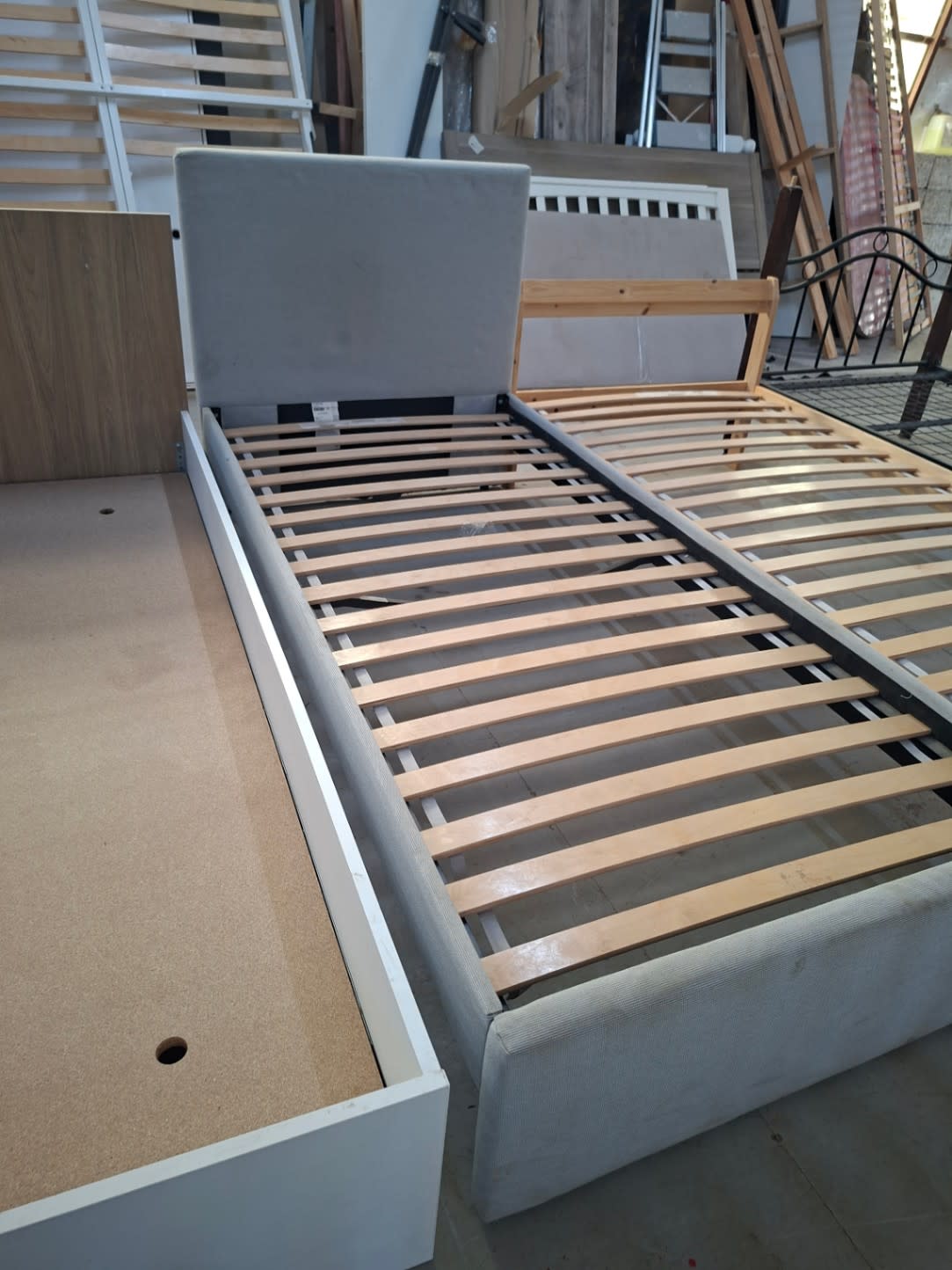 Full view of used single upholstered bed frame light grey with headboard at Shop E Bufaisal Ajman