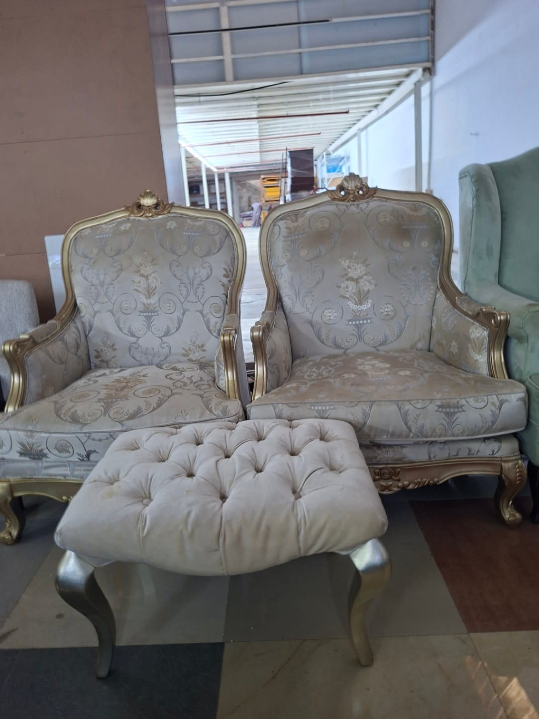 Used classic Baroque armchair set with ottoman showing both chairs and tufted ottoman at Bufaisal Ajman