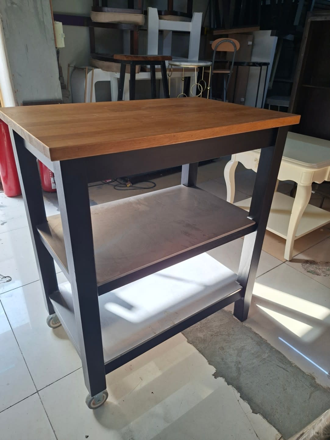 Bufaisal barcode label for used kitchen island trolley at Shop C Ajman