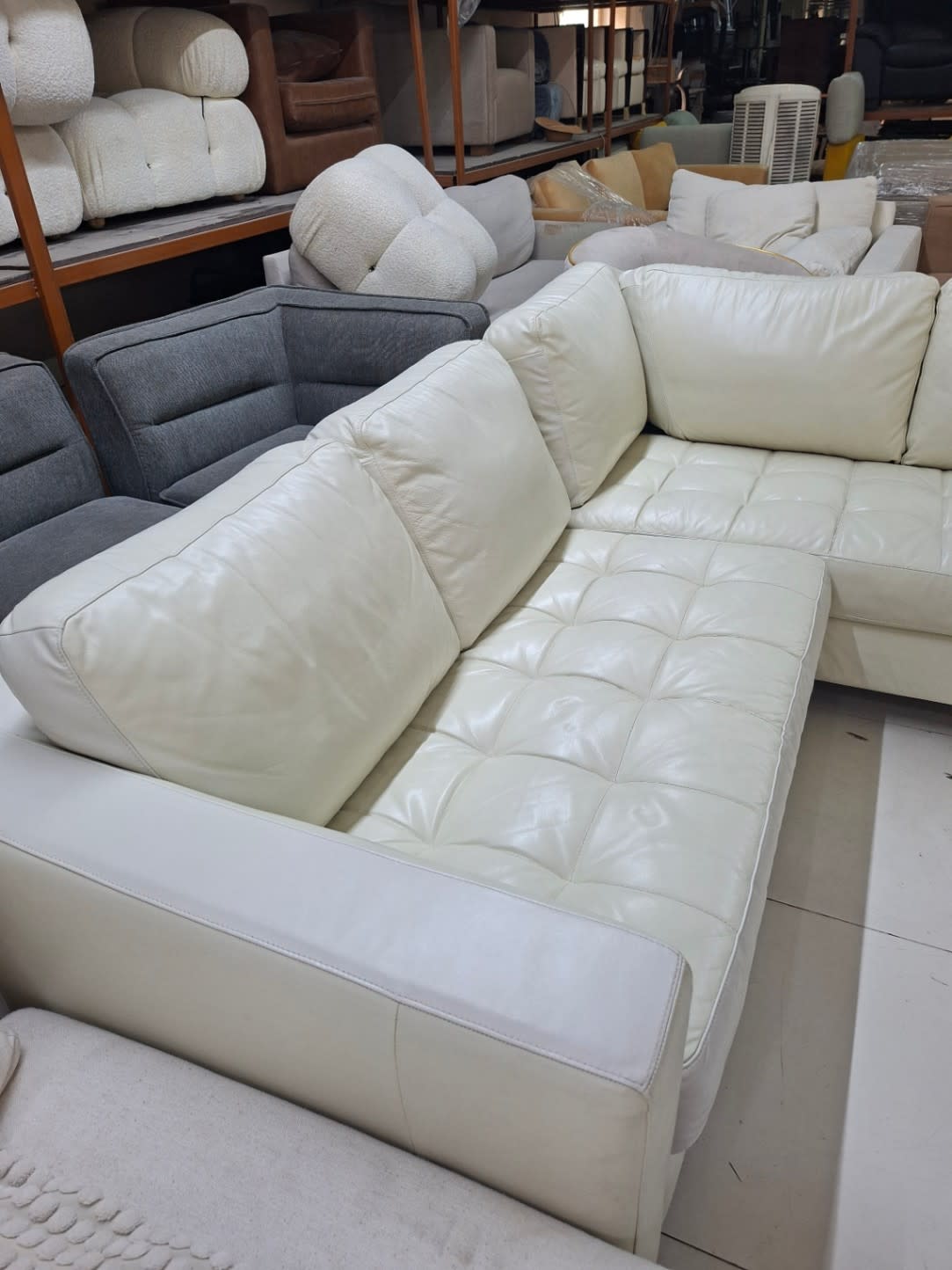 Another angle of used cream L-shape sectional sofa showing overall good condition at Bufaisal Ajman