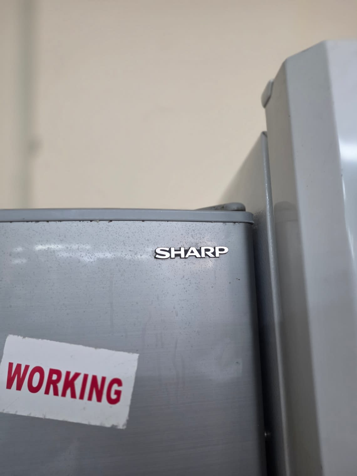 Bufaisal barcode label photo — barcode unreadable for used Sharp top-mount refrigerator