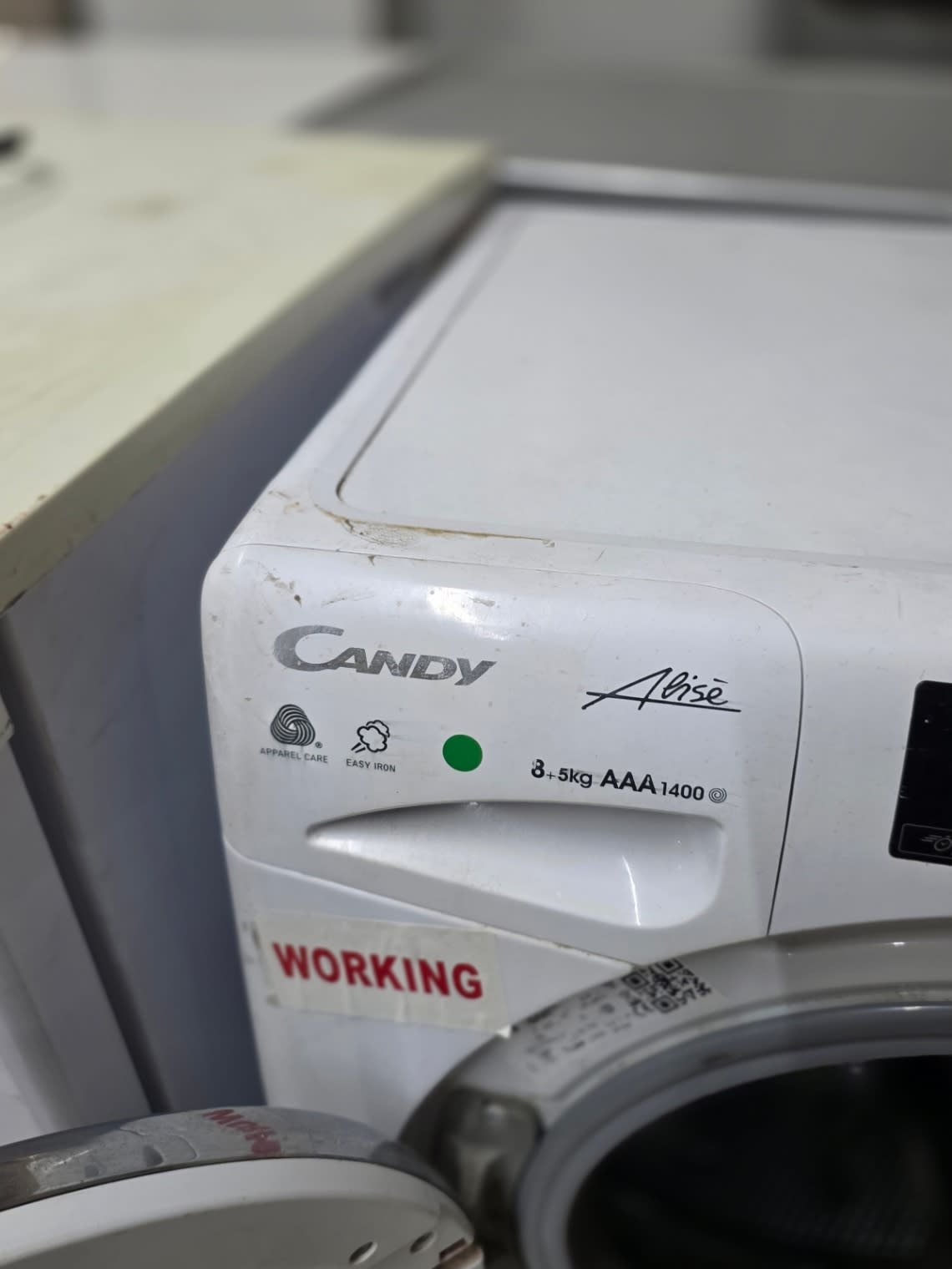 Candy Alise brand label showing 8kg plus 5kg AAA 1400rpm spec on used washer-dryer combo
