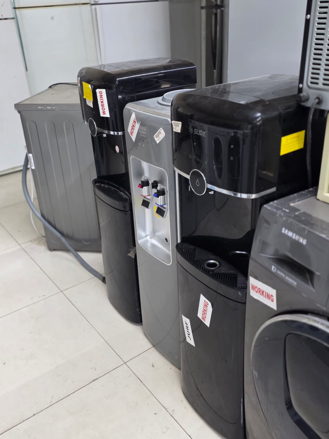 Bufaisal barcode label for used Nestlé Waters top-load water dispenser — label unreadable, UUID fallback used