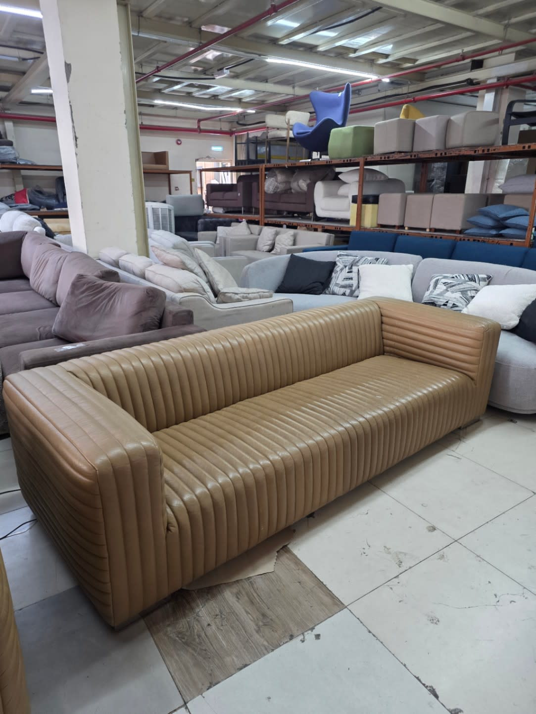 Bufaisal barcode label for used tan ribbed faux leather sofa set