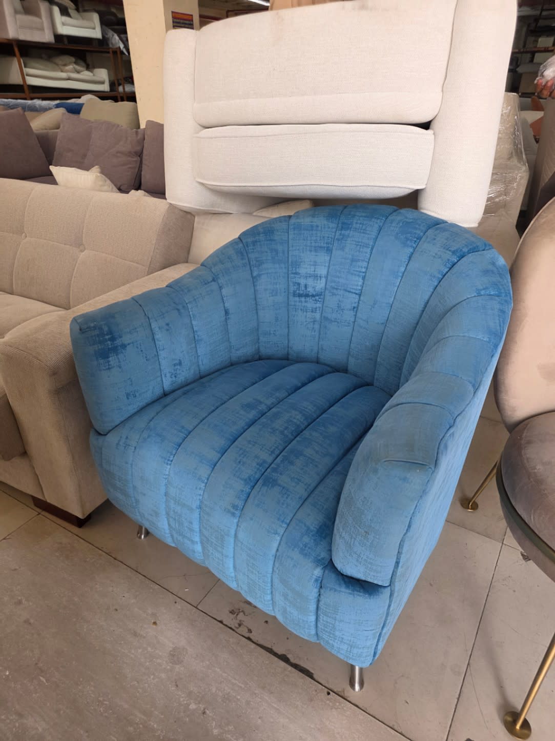 Bufaisal barcode label for used blue channel-tufted barrel accent chair — label unreadable