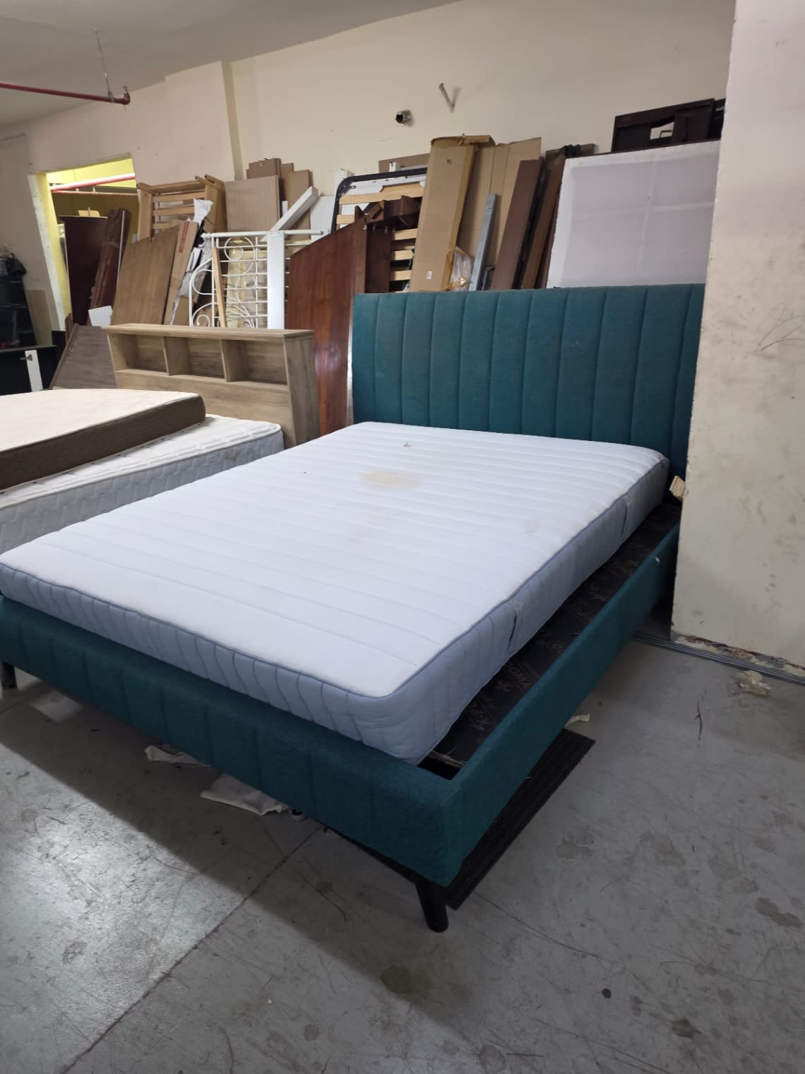 Additional angle of used teal king bed frame with mattress at Shop C Bufaisal Ajman