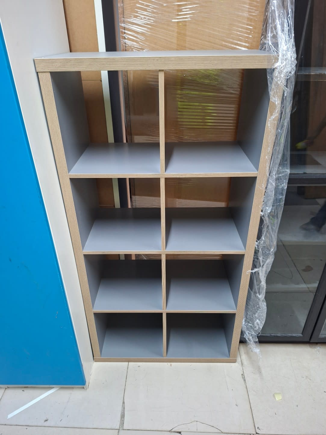 Bufaisal barcode label for used 8-cube open shelving unit at Shop C Ajman