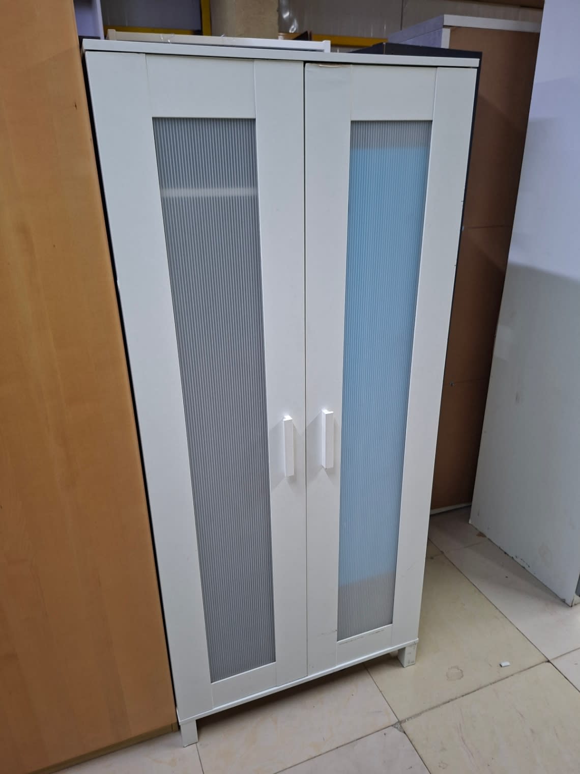 Bufaisal barcode label for used 2-door white wardrobe with frosted glass panels