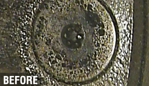 Injector tip before the BG service, with carbon deposits