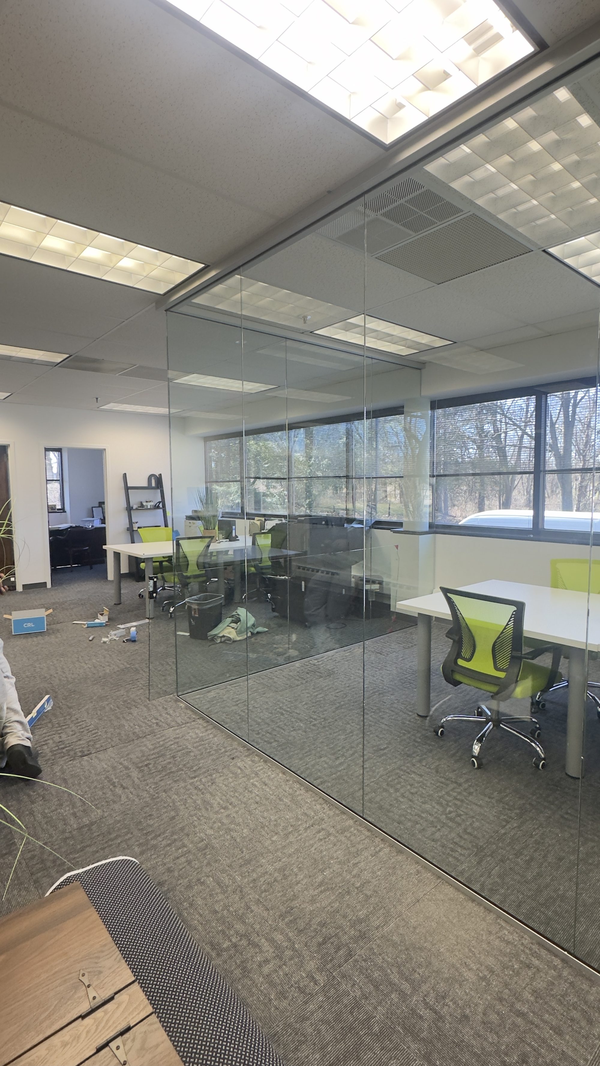 Modern frameless glass office partitions for commercial interiors