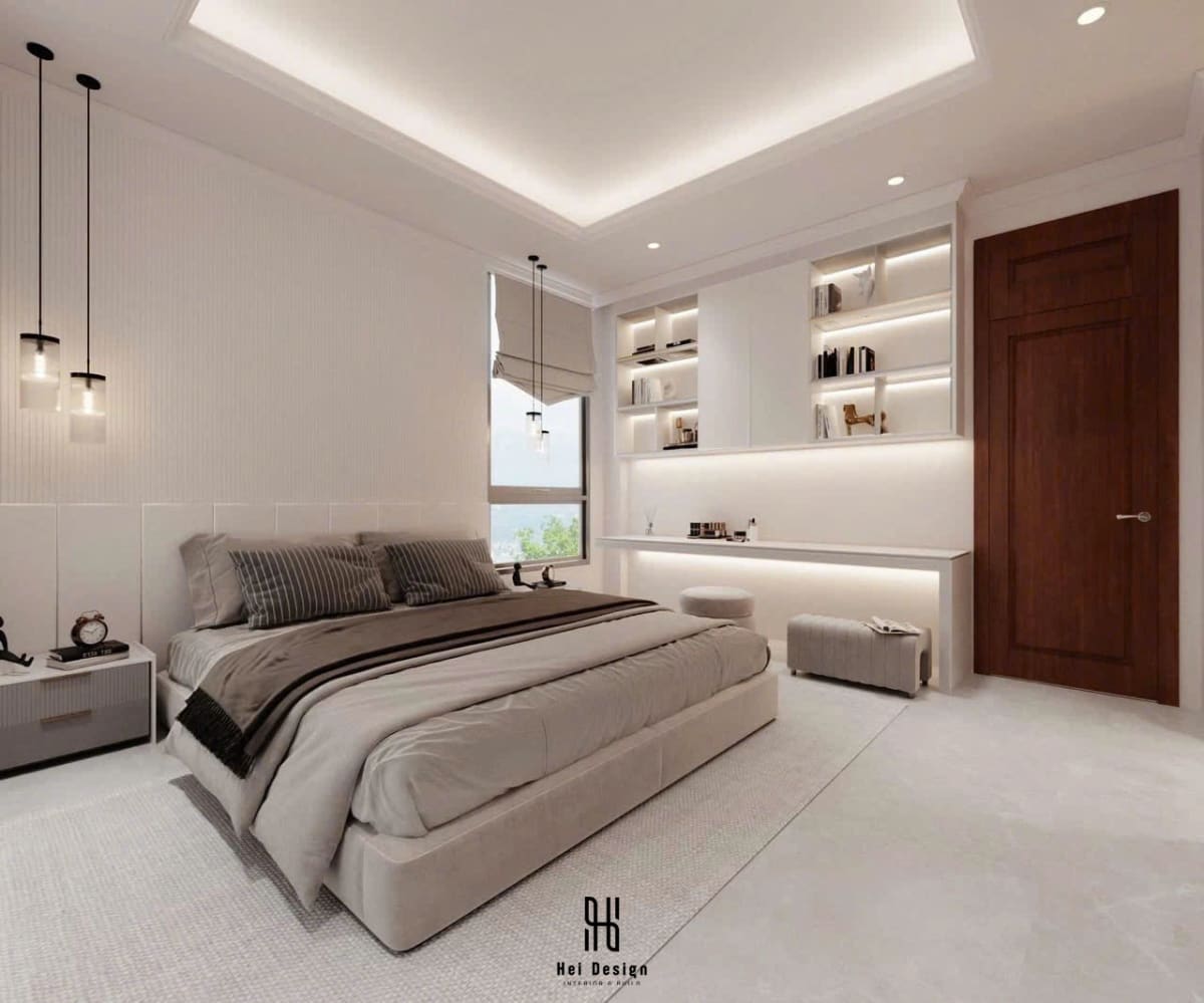 Phòng ngủ kết hợp bàn làm việc và tủ quần áo kính trong nhà phố Bình Phước