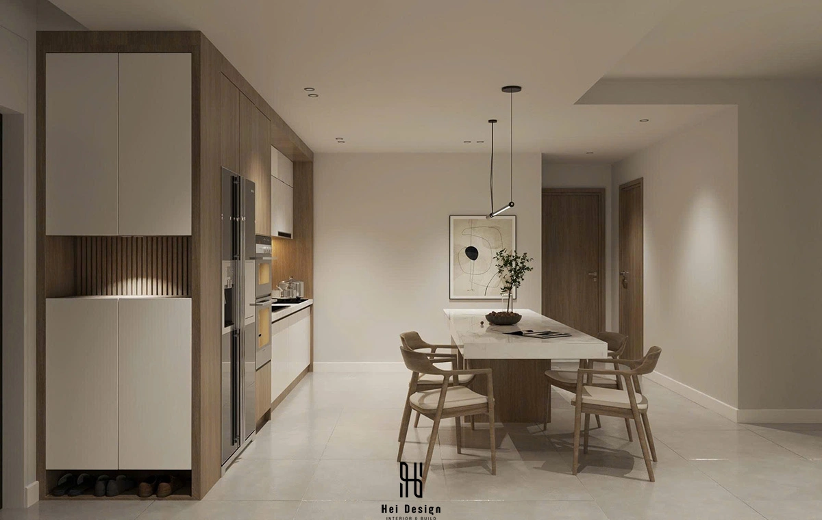 Không gian bếp và bàn ăn liên thông – Đảo bếp marble trắng và hệ tủ gỗ sồi