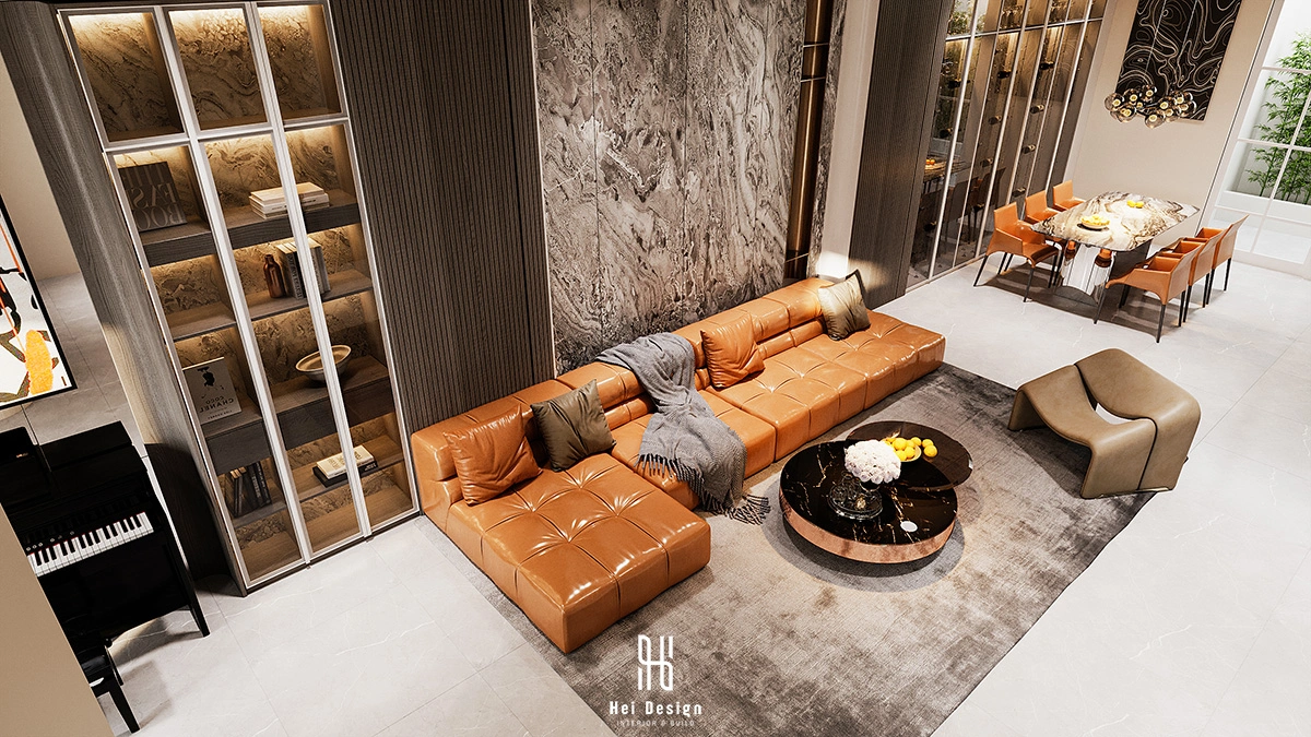 Chi tiết vách tivi đá marble và sofa boucle – phòng khách Villa Tân An Long An