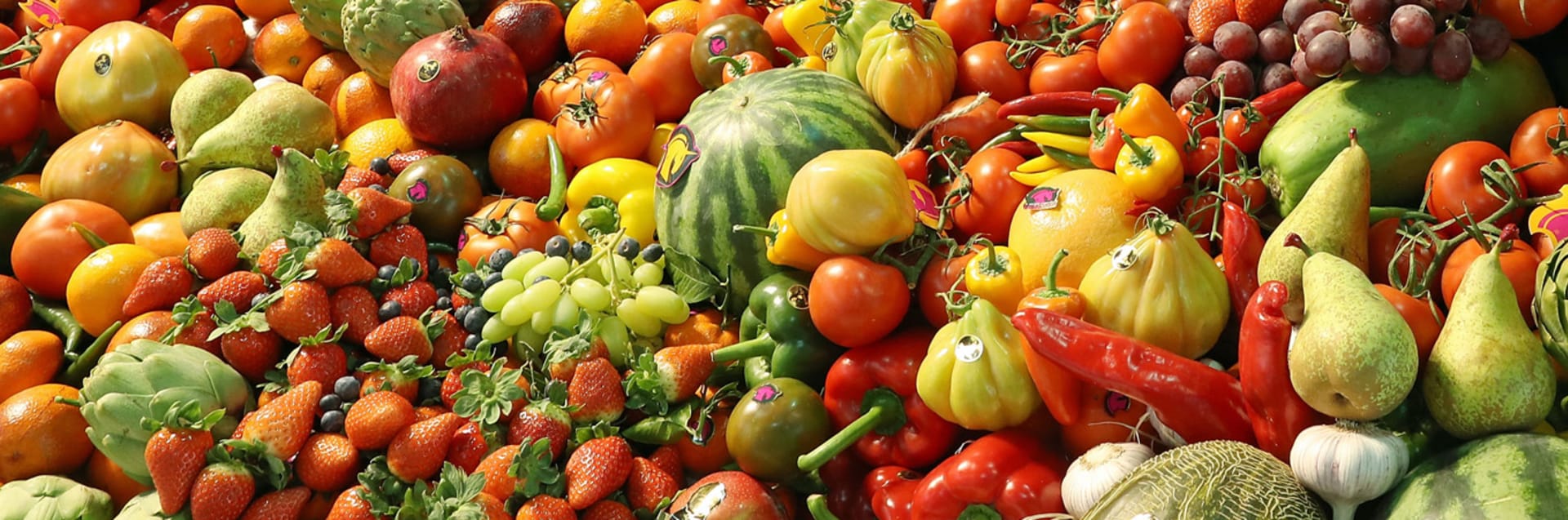 Fruit Logistica Agricultural Trade Fair BERLIN, GERMANY - FEBRUARY 08: Visitors look at a display of fresh fruits and vegetables at a Spanish producer's stand at the Fruit Logistica agricultural trade fair on February 8, 2017 in Berlin, Germany. The fair, which takes place from February 8-10, is taking place amidst poor weather and harvest conditions in Spain that have led to price increases and even rationing at supmermarkets for fresh vegetables across Europe. (Photo by Sean Gallup/Getty Images)