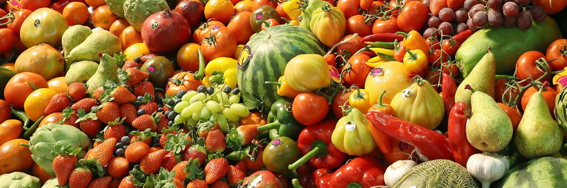 BERLIN, GERMANY - FEBRUARY 08:  Visitors look at a display of fresh fruits and vegetables at a Spanish producer's stand at the Fruit Logistica agricultural trade fair on February 8, 2017 in Berlin, Germany. The fair, which takes place from February 8-10, is taking place amidst poor weather and harvest conditions in Spain that have led to price increases and even rationing at supmermarkets for fresh vegetables across Europe.  (Photo by Sean Gallup/Getty Images)