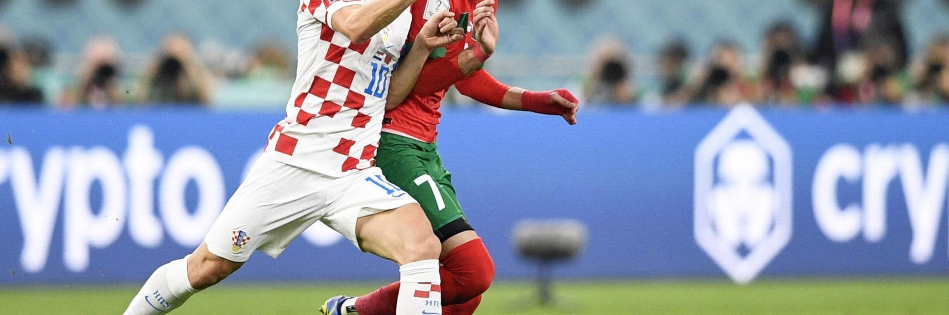 Football World Cup in Qatar Croatia s Luka Modric L and Morocco s Hakim Ziyech vie for the ball during the first half of the World Cup football third-place playoff at Khalifa International Stadium in Doha, Qatar, on Dec. 17, 2022. 