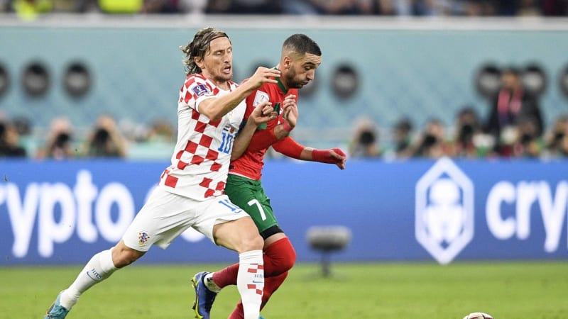 Football World Cup in Qatar Croatia s Luka Modric L and Morocco s Hakim Ziyech vie for the ball during the first half of the World Cup football third-place playoff at Khalifa International Stadium in Doha, Qatar, on Dec. 17, 2022. 