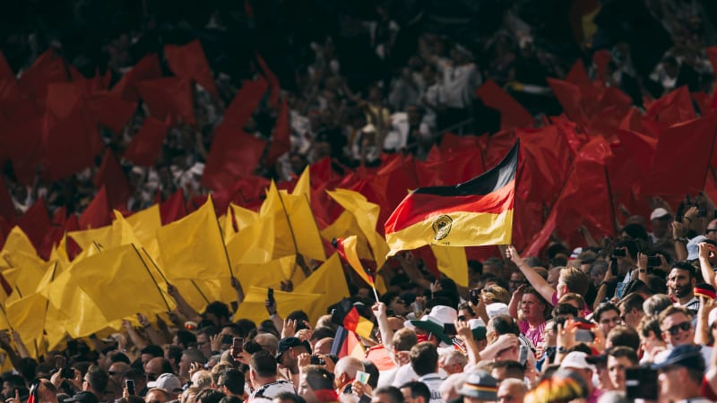 Stuttgart, MHP Arena, 19.06.2024: German fans with flags during the match UEFA European Championship, EM, Europameisters