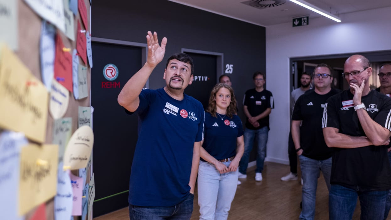 WOLFSBURG, GERMANY - OCTOBER 13: Charly Rokoss speaks during the Club Advisors Event on October 13, 2023 at Volkswagen Arena in Wolfsburg, Germany. (Photo by Oliver Hardt/Getty Images)
